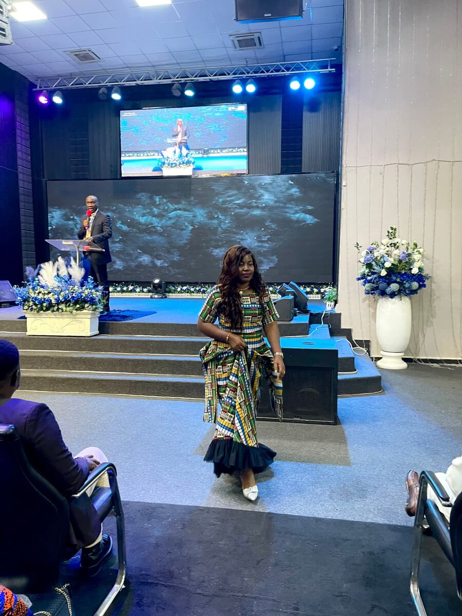 A moment from a Mrs & More gathering — a guest arriving in celebration attire.